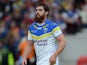 Tyrone McCarthy of Warrington in action during the Carnegie Challenge Cup Semi Final match between Huddersfield Giants and Warrington Wolves at Salford City Stadium on July 15, 2012