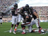 Alshon Jeffery of the Chicago Bears is congratulated after catching a touchdown against the New Orleans Saints on October 6, 2013