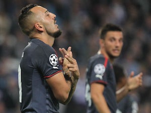 Mitroglou hat-trick gives Olympiacos win