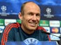 Bayern Munich's Dutch midfielder Arjen Robben addresses a press conference at The City of Manchester stadium in Manchester, northwest England, on October 1, 2013