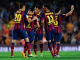 Alexis Sanchez of FC Barcelona celebrates with his team-mates after scoring his team's first goal during the La Liga match between FC Barcelona and Real Valladolid CF at Camp Nou on October 5, 2013