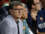 Barcelona's Argentinian coach Gerardo Martino looks on during the Spanish league football match FC Barcelona vs Real Valladolid CF at the Camp Nou stadium in Barcelona on October 5, 2013