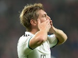 Bayern Munich's midfielder Toni Kroos reacts after the first goal for Munich during the German first division Bundesliga football match Bayer Leverkusen vs FC Bayern Munich in the western German city of Leverkusen on October 5, 2013