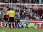 Mark Bradley of Rotherham United scores the opening goal during the Sky Bet League One match between Brentford and Rotherham United at Griffin Park, on October 05, 2013