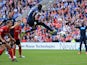Papiss Cissé of Newcastle United has a shot saved during the Barclays Premier League match between Cardiff City and Newcastle United at Cardiff City Stadium on October 5, 2013