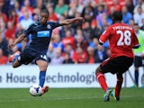 Loïc Rémy of Newcastle United scores his second goal of the match against Cardiff City on October 5, 2013