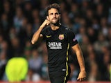 Barcelona's Cesc Fabregas celebrates after scoring the opening goal against Celtic during their Champions League group match on October 1, 2013