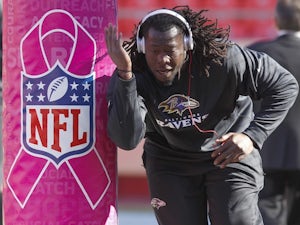 Baltimore's Courtney Upshaw warms up before a game with Kansas City on October 7, 2012