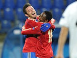 CSKA Moscow's Zoran Tosic and Ahmed Musa celebrate during their UEFA Champions League group D match against FC Viktoria Plzen in Saint-Petersburg on October 2, 2013