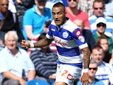 Danny Simpson of Queens Park Rangers controls the ball during the Sky Bet Championship match between Queens Park Rangers and Sheffield Wednesday at Loftus Road on August 3, 2013