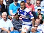 Danny Simpson of Queens Park Rangers controls the ball during the Sky Bet Championship match between Queens Park Rangers and Sheffield Wednesday at Loftus Road on August 3, 2013