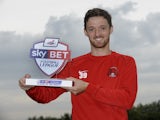 UNDER EMBARGO UNTIL 6AM 4/10/13: Leyton Orient striker David Mooney with his League One Player of the Month Award for September, on October 3, 2013