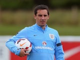 England coach Gary Neville watches a training session on August 11, 2013