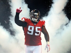Jonathan Babineaux of the Atlanta Falcons enters the field for a game with Green Bay on October 9, 2011
