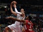 Jordan Farmar of Anadolu Efes (L) jumps to score during the Euroleague playoff basketball game Olympiakos vs Efes in Athens on April 26, 2013