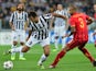 Juventus forward Mirko Vucinic tries to get past Galatasaray's midfielder Felipe Melo during their group B Champions League match between Juventus and Galatasaray at Juventus Stadium Turin on October 2, 2013