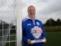 UNDER EMBARGO UNTIL 6AM 4/10/13: Rochdale boss Keith Hill with his September Manager of the Month award on October 3, 2013