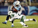 Kyle Wilson #20 of the New York Jets tackles Nate Washington #85 of the Tennessee Titans on December 17, 2012 