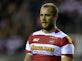 Wigan confirm Mossop return