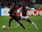 Ajax's Lerin Duarte and Milan's Robinho battle for the ball during their Champions League group match on October 1, 2013