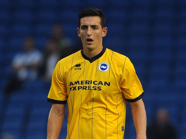 Lewis Dunk of Brighton during the pre season friendly match between Brighton & Hove Albion and Norwich City at The Amex Stadium on July 30, 2013