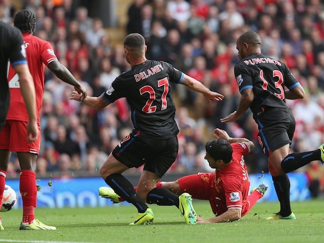 Liverpool striker Luis Suarez opens the scoring against Crystal Palace during the Barclays Premier League match on October 5, 2013