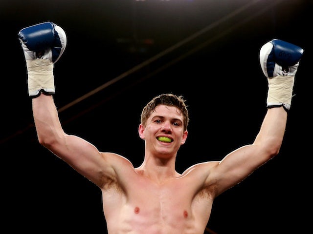 British boxer Luke Campbell celebrates his victory over Andy Harris on July 13, 2013