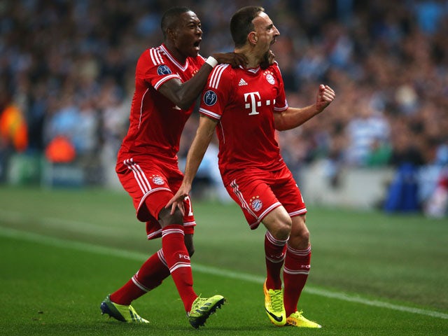 Franck Ribery celebrates after scoring against Manchester City during the Champions League match on October 2, 2013