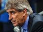Manuel Pellegrini, coach of Manchester City looks on during the UEFA Champions League Group D match between Manchester City and FC Bayern Muenchen at Etihad Stadium on October 2, 2013