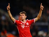 Thomas Müller of Bayern Munich celebrates scoring against Manchester City during the Champions League match on October 2, 2013