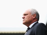 Fulham boss Martin Jol stands on the touchline during the Barclays Premier League game against Stoke City at Craven Cottage on October 5, 2013