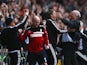 Fulham manager Martin Jol celebrates Darren Bent's winner against Stoke City in the Barclays Premier League match on October 5, 2013