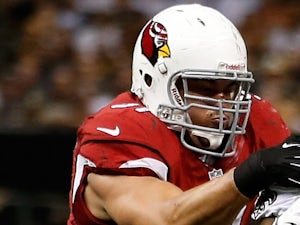 Matt Shaughnessy of the Arizona Cardinals makes a tackle against New Orleans on September 22, 2013