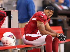 Cardinals' Michael Floyd sits on the bench during the game with Detroit on December 16, 2012