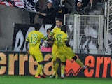Nantes Serbian forward Filip Djordjevic jubilates with teamates after scoring during the French L1 football match Nantes against Evian-Thonon on 5 October, 2013