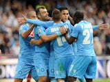 Josè Maria Callejon of Napoli celebates with team mates after scoring the goal 3-0 during the Serie A match between SSC Napoli and AS Livorno Calcio at Stadio San Paolo on October 6, 2013