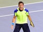 Nicolas Almagro of Spain reacts after his victory against Kei Nishikori of Japan during their quarter-final match of the Japan Open tennis tournament in Tokyo on October 4, 2013