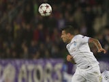 Porto's Argentinian defender Nicolas Otamendi heads the ball during the UEFA Champions League Group G football match Austria Wien vs Porto at the Ernst Happel stadium in Vienna on September 18, 2013