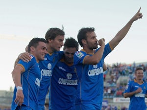 Getafe climb to safety with shock win