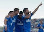 Pedro Leon of Getafe CF celebrates scoring their second goal with teammates during the La Liga against Real Betis on October 6, 2013