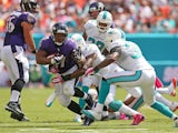 Ray Rice of the Baltimore Ravens rushes during a game against the Miami Dolphins at Sun Life Stadium on October 6, 2013
