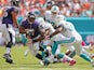 Ray Rice of the Baltimore Ravens rushes during a game against the Miami Dolphins at Sun Life Stadium on October 6, 2013