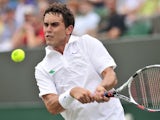US tennis player Ryan Sweeting in action at Wimbledon on June 27, 2013