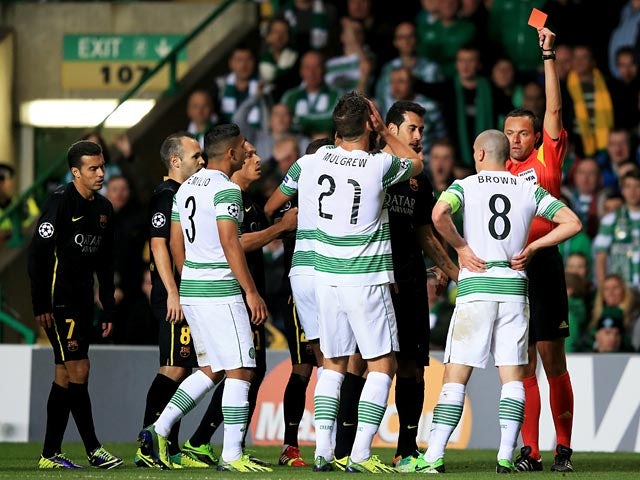 Celtic's Scott Brown is shown a straight red card in the second half against Barcelona during their Champions League group match on October 1, 2013