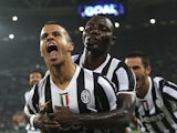 Sebastian Giovinco of Juventus celebrates his goal with Kwadwo Asamoah during the Serie A match against AC Milan at Juventus Arena on October 6, 2013 
