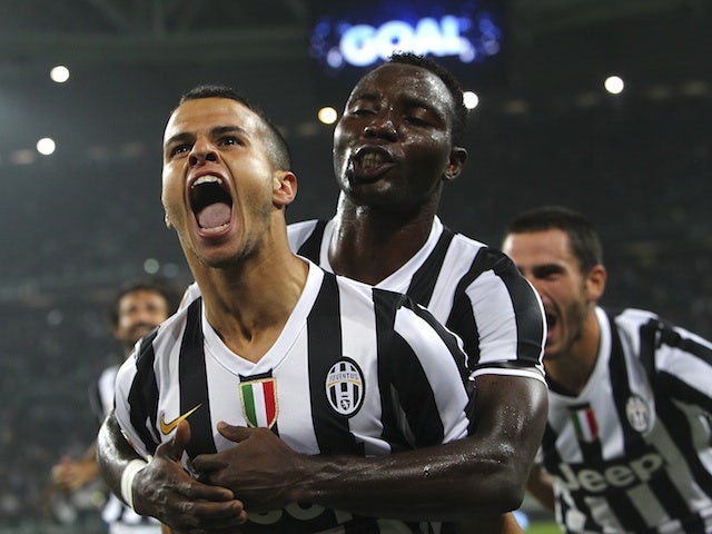 Sebastian Giovinco of Juventus celebrates his goal with Kwadwo Asamoah during the Serie A match against AC Milan at Juventus Arena on October 6, 2013 