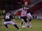 Jose Baxter of Sheffield Utd gets between Mike Jones and Dannie Bulman of Crawley Town during the Sky Bet League One match between Sheffield United and Crawley Town at Bramall Lane on October 04, 2013