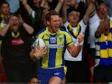 Joel Monaghan of Warrington celebrates after scoring his team's first try during the Super League Grand Final between Warrington Wolves and Wigan Warriors at Old Trafford on October 5, 2013