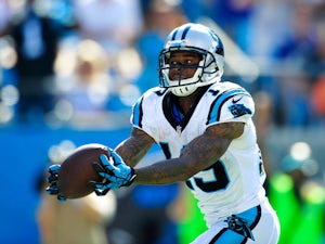 Ted Ginn Jr. #19 of the Carolina Panthers makes a fingertip catch for a touchdown against the New York Giants during play at Bank of America Stadium on September 22, 2013
