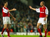 Steve Bould congratulates Tony Adams during his testimonial match in May 2002.